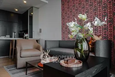 Modern living room with stylish decor and open kitchen layout