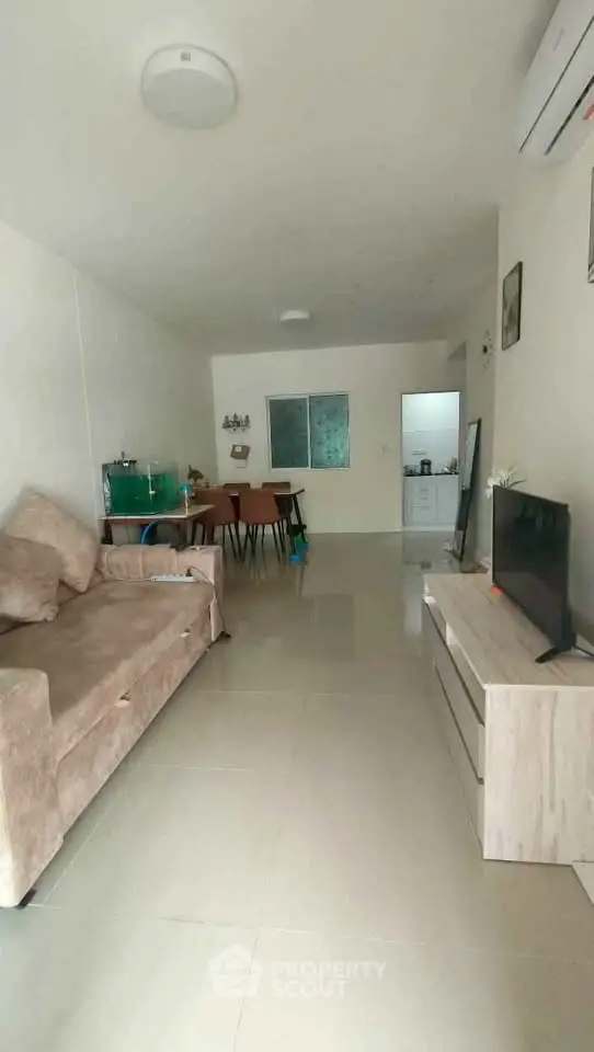 Spacious living room with modern furniture and open layout