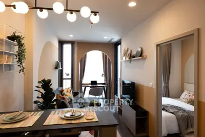 Modern open-plan living room with stylish decor and natural light