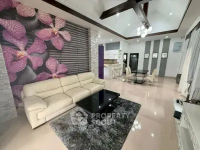 Luxurious living room with modern decor and floral accent wall