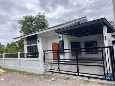 Charming single-story house with modern design and spacious driveway, perfect for family living.