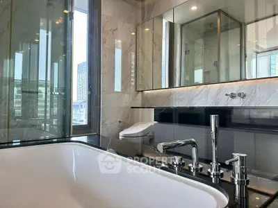Luxurious modern bathroom with marble finishes and city view, featuring a sleek bathtub and elegant fixtures.