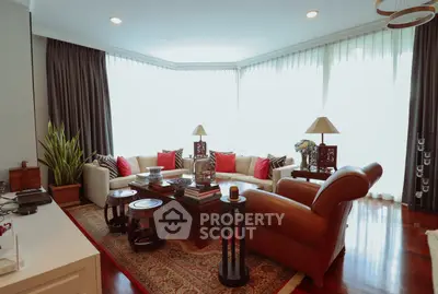 Luxurious living room with elegant decor and abundant natural light