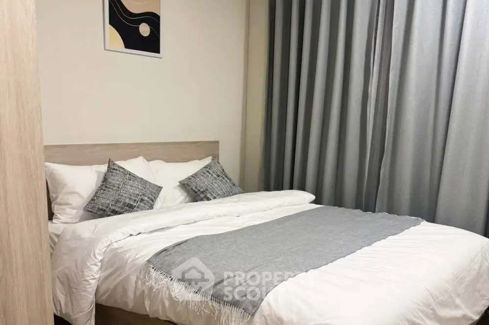 Cozy modern bedroom with twin beds and stylish decor