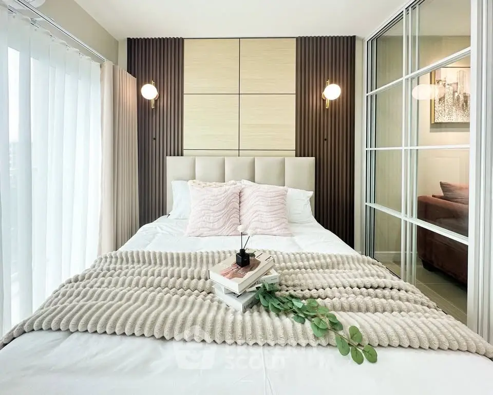 Modern bedroom with elegant decor and natural light
