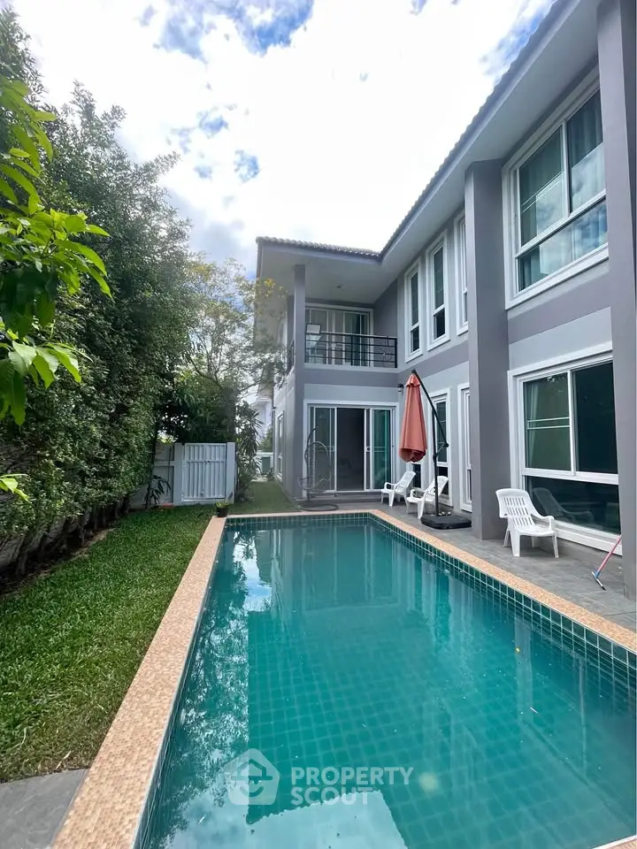 Luxurious modern home with private pool and lush garden, perfect for relaxation and entertaining.