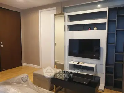 Modern living room with sleek TV unit and stylish decor