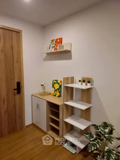 Modern interior with stylish shelving and wooden flooring, perfect for contemporary living spaces.