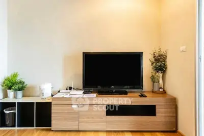 Modern living room with sleek TV unit and stylish decor