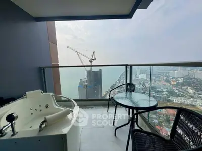 Luxurious balcony with jacuzzi and stunning city and ocean view