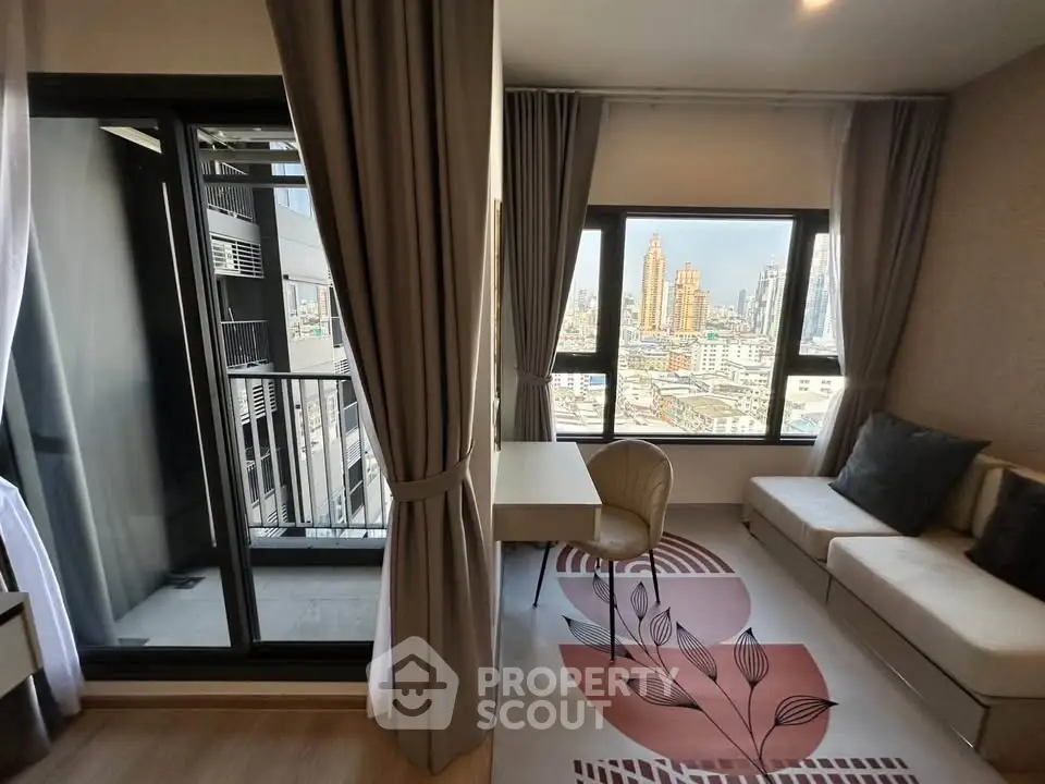 Modern living room with city view and balcony access in high-rise apartment