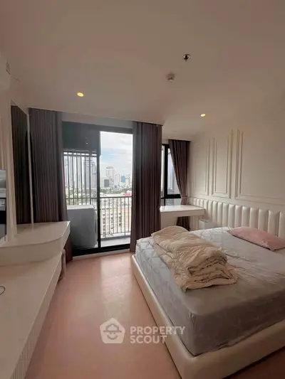 Spacious bedroom with city view and elegant decor in modern apartment