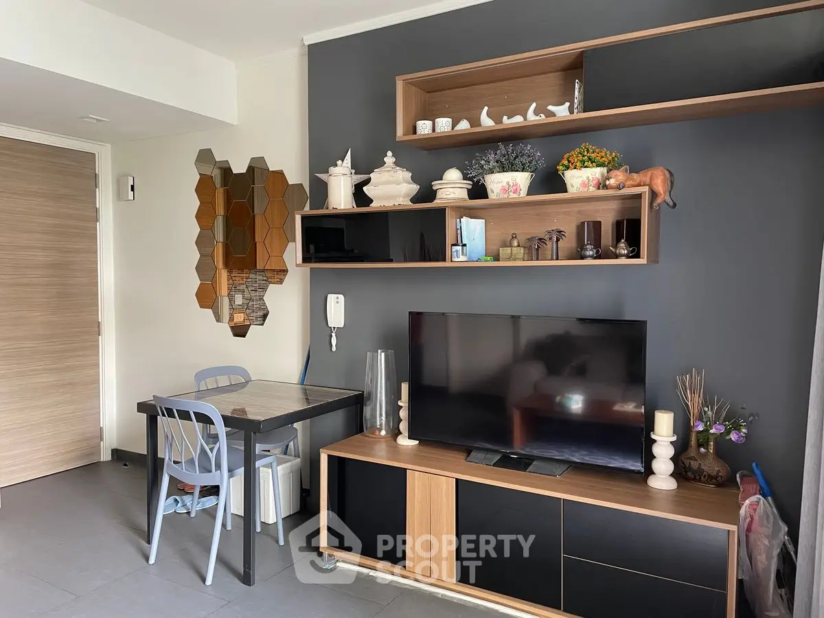 Modern living room with stylish decor and entertainment center
