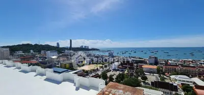 Stunning coastal cityscape with panoramic ocean views and vibrant urban landscape.