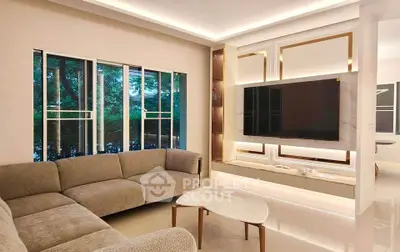 Luxurious modern living room with elegant lighting and large TV