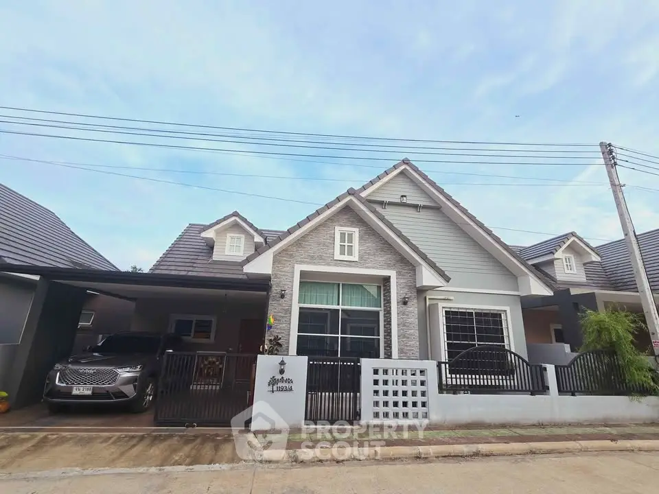 Charming suburban house with modern design and spacious driveway in a peaceful neighborhood.