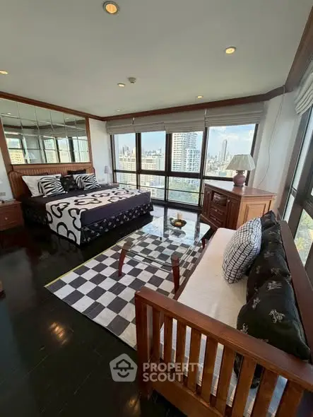 Luxurious bedroom with panoramic city views and elegant decor