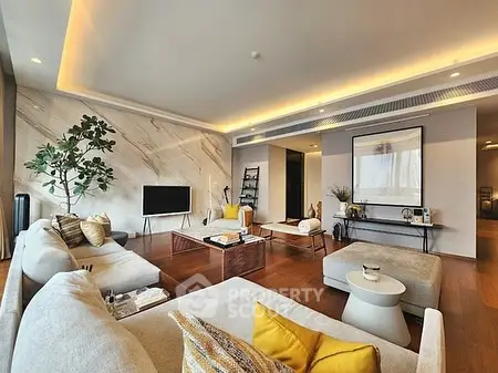 Luxurious modern living room with elegant decor and ambient lighting