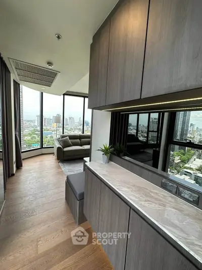 Luxurious corner unit with panoramic city views and modern interior design