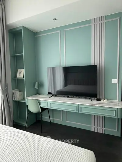 Modern bedroom with stylish built-in TV unit and elegant decor
