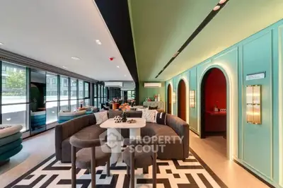 Luxurious modern living room with stylish decor and ample natural light