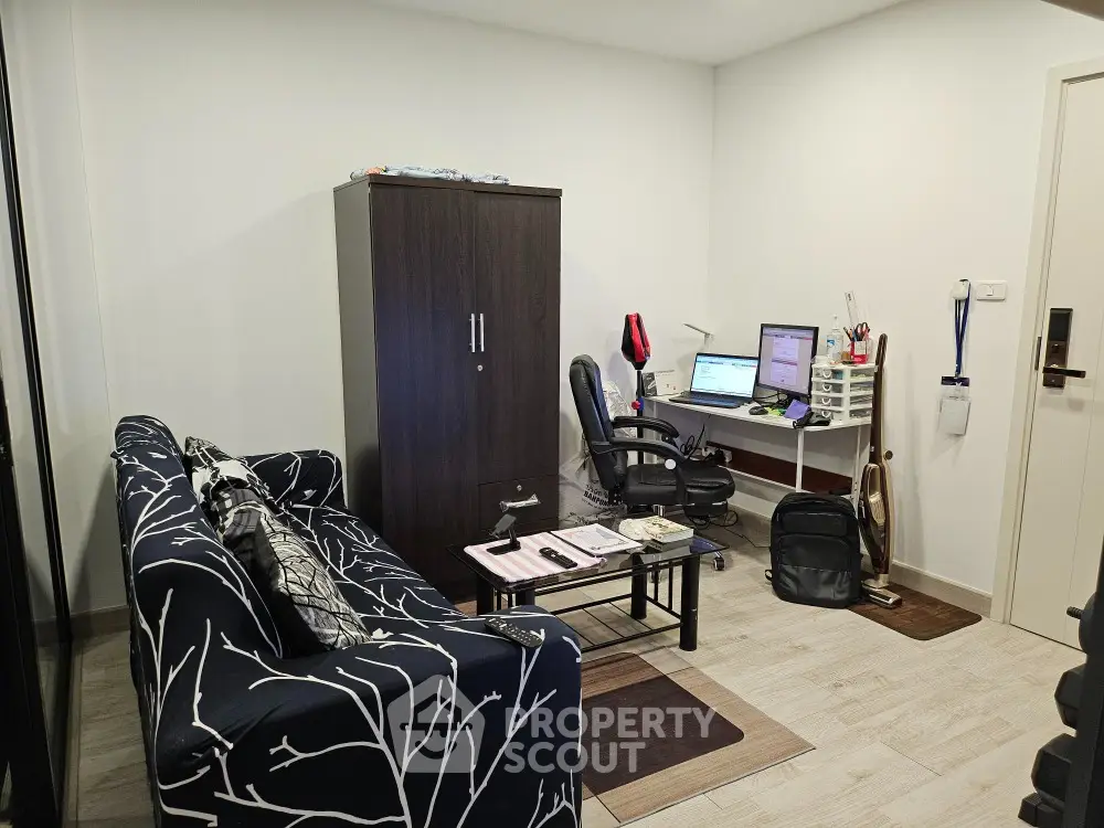 Cozy study room with modern desk and comfortable seating