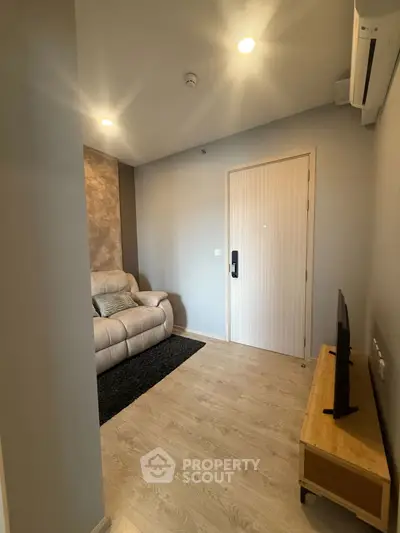 Cozy living room with modern decor and comfortable seating