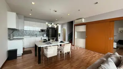 Spacious modern kitchen with dining area and stylish decor