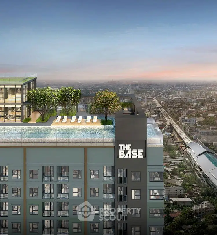 Stunning rooftop pool with panoramic city views at The Base condominium.