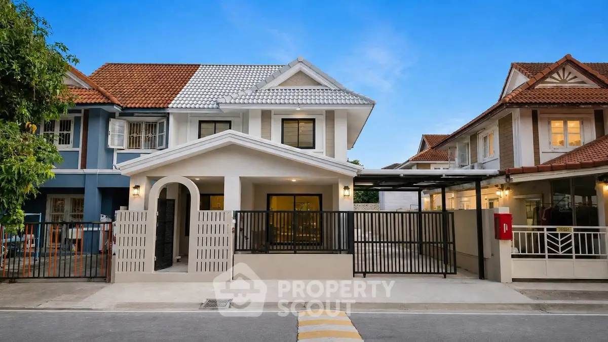 Charming suburban house with modern facade and gated driveway in a peaceful neighborhood.