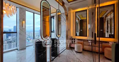 Luxurious high-rise apartment with stunning city view and elegant interior design.