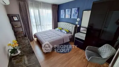 Modern bedroom with stylish decor and natural light