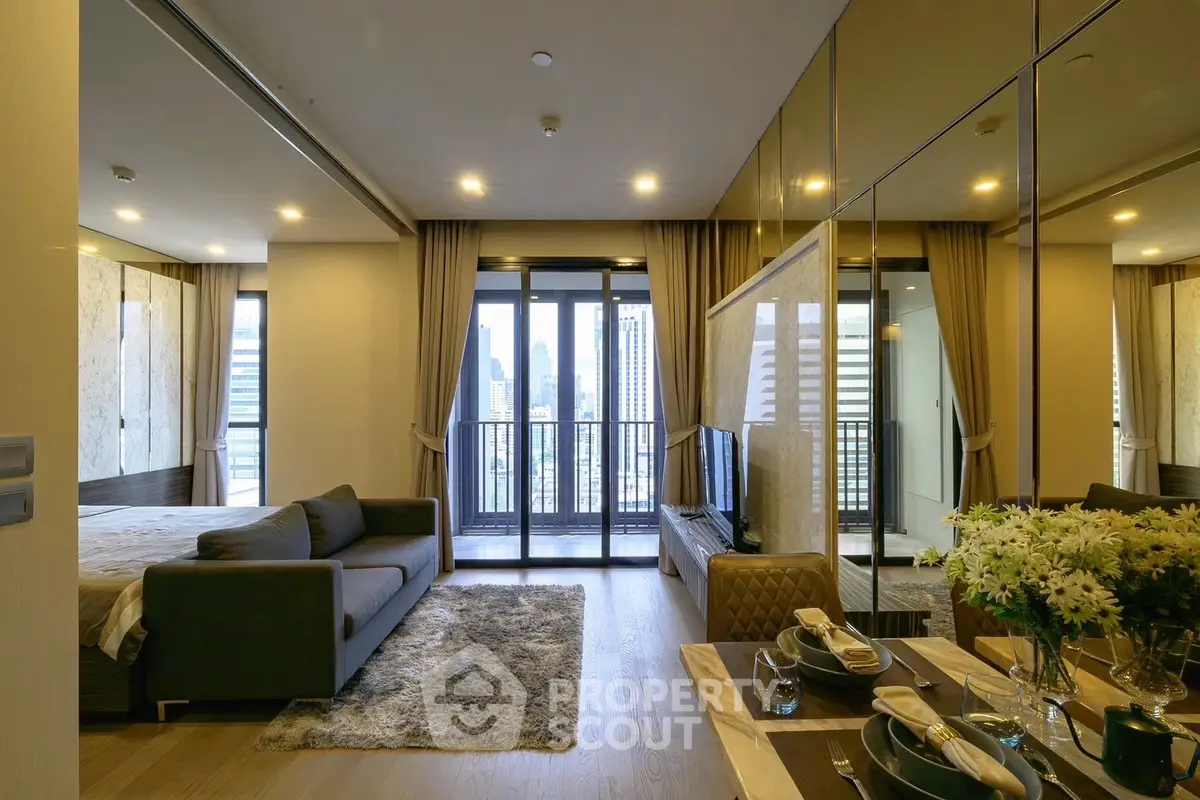 Luxurious living room with city view, modern decor, and elegant dining setup in a high-rise apartment.