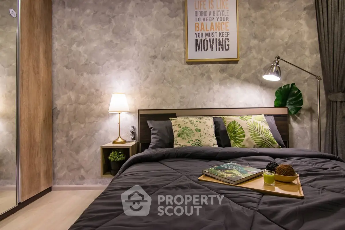 Cozy bedroom with stylish decor and ambient lighting