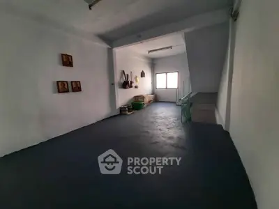 Spacious storage area with natural light and minimal decor