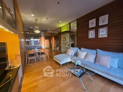 Spacious living room with elegant decor and wooden flooring