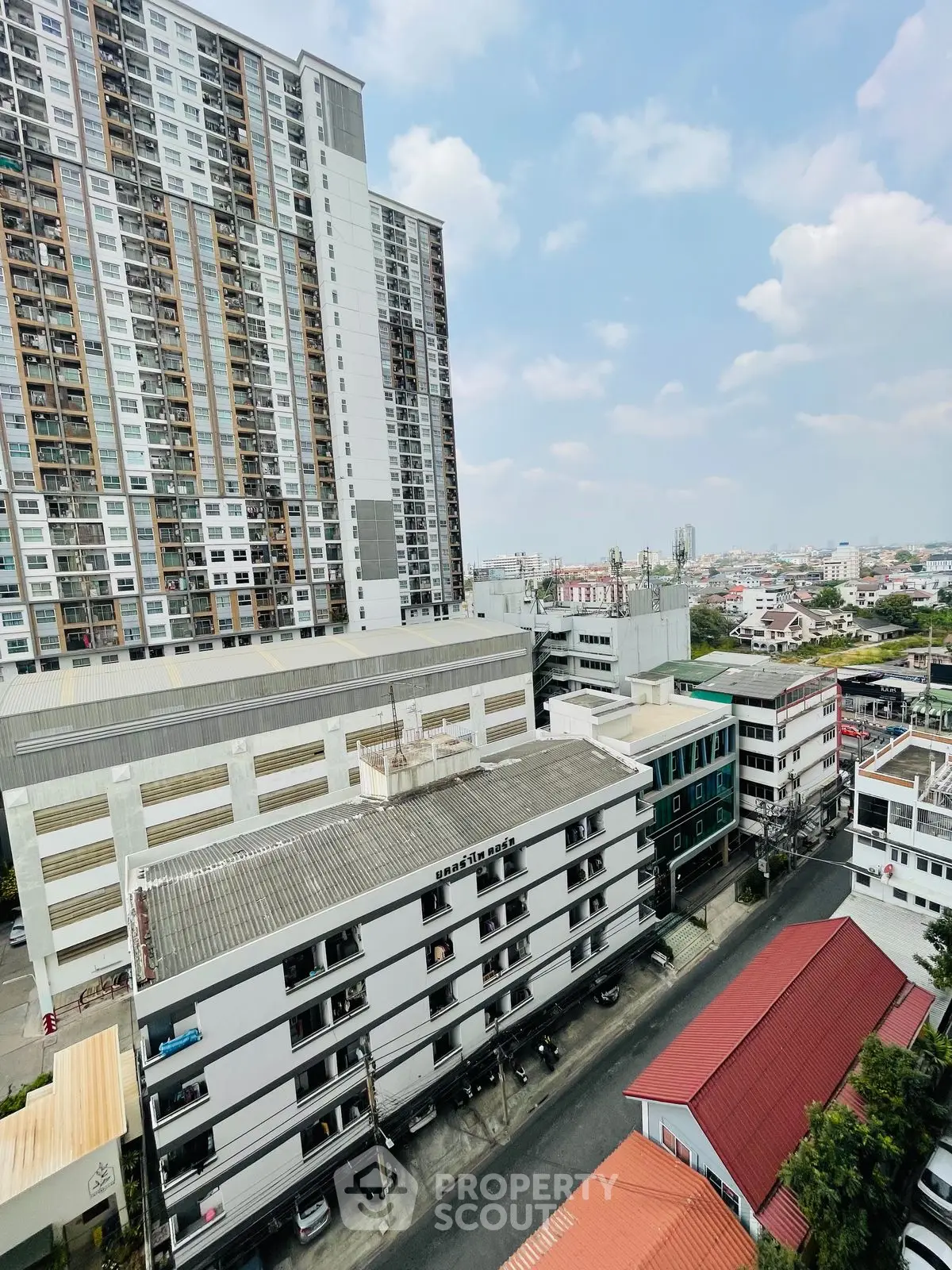 Stunning urban view of high-rise residential buildings with clear blue skies.
