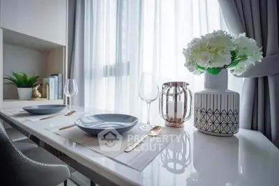 Elegant dining area with modern decor and natural light