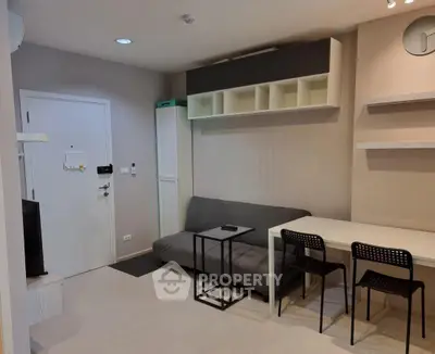 Modern living room with sleek furniture and minimalist design, perfect for urban living.