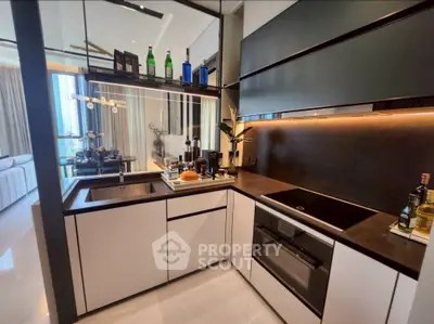 Modern kitchen with sleek design and open layout in luxury apartment