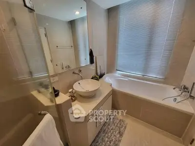 Modern bathroom with sleek design and bathtub
