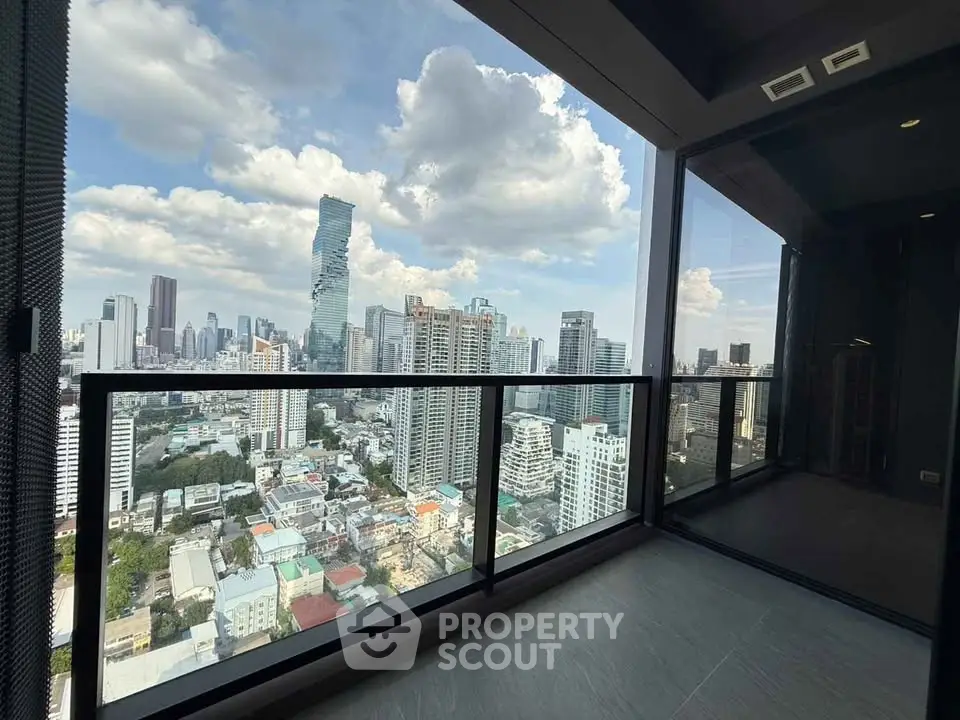 Stunning cityscape view from a modern high-rise balcony, perfect for urban living enthusiasts.