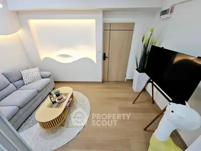 Modern living room with stylish decor and cozy seating area