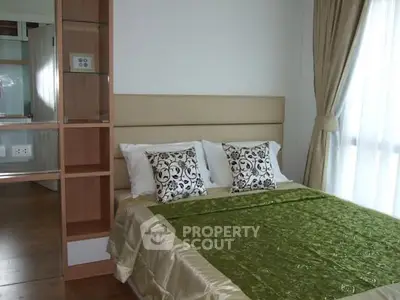 Cozy bedroom with elegant decor and natural light