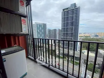 Modern high-rise apartment balcony with cityscape view and washing machine.