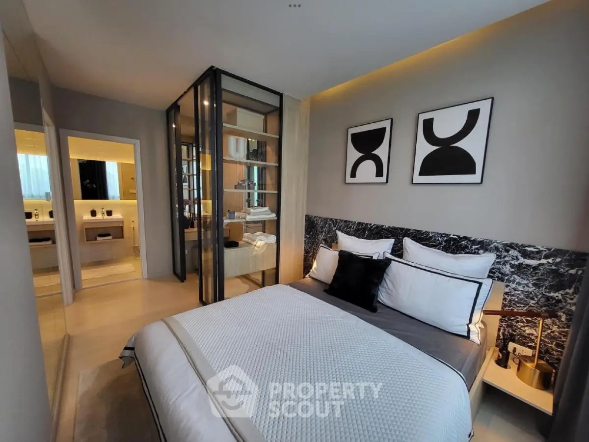 Luxurious modern bedroom with ensuite bathroom and stylish decor