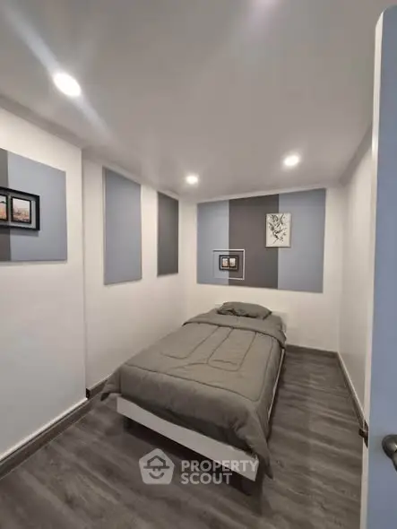 Cozy minimalist bedroom with modern decor and soft lighting