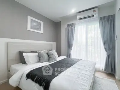 Modern bedroom with stylish decor and natural light