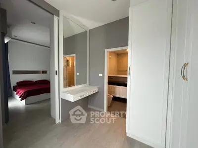 Modern bedroom with ensuite bathroom and stylish decor