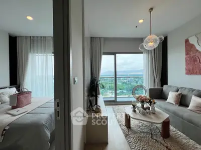 Modern apartment with stunning view, cozy living room, and elegant bedroom.